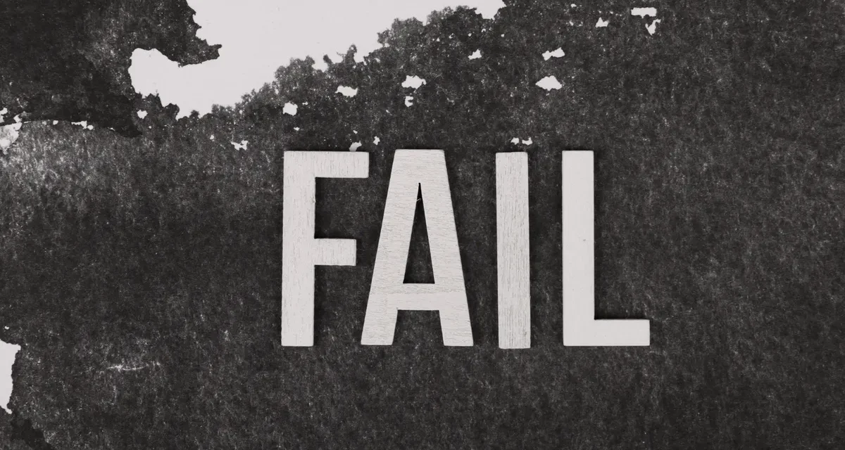 Large FAIL text on a dark background