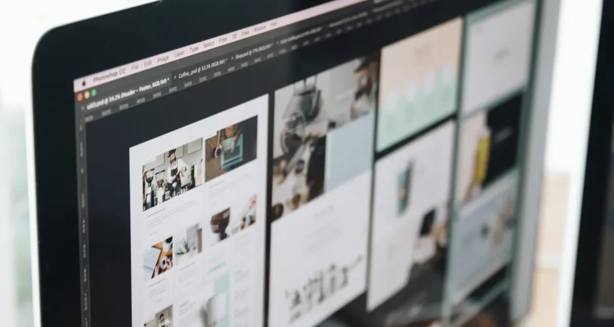 monitor showing multiple webpage layouts