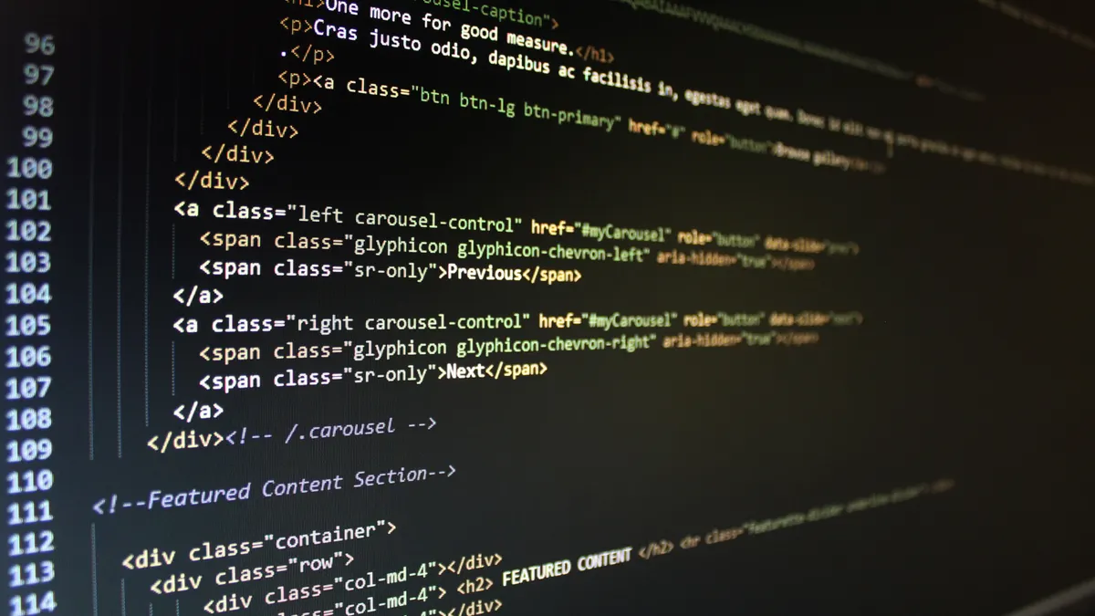 screen filled with HTML and webpage code