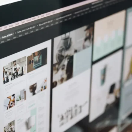 monitor showing multiple webpage layouts