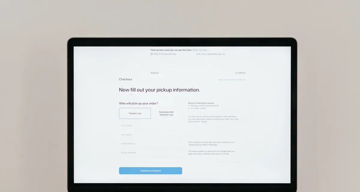 Laptop displaying a simple webpage form