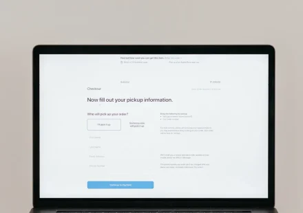 Laptop displaying a simple webpage form