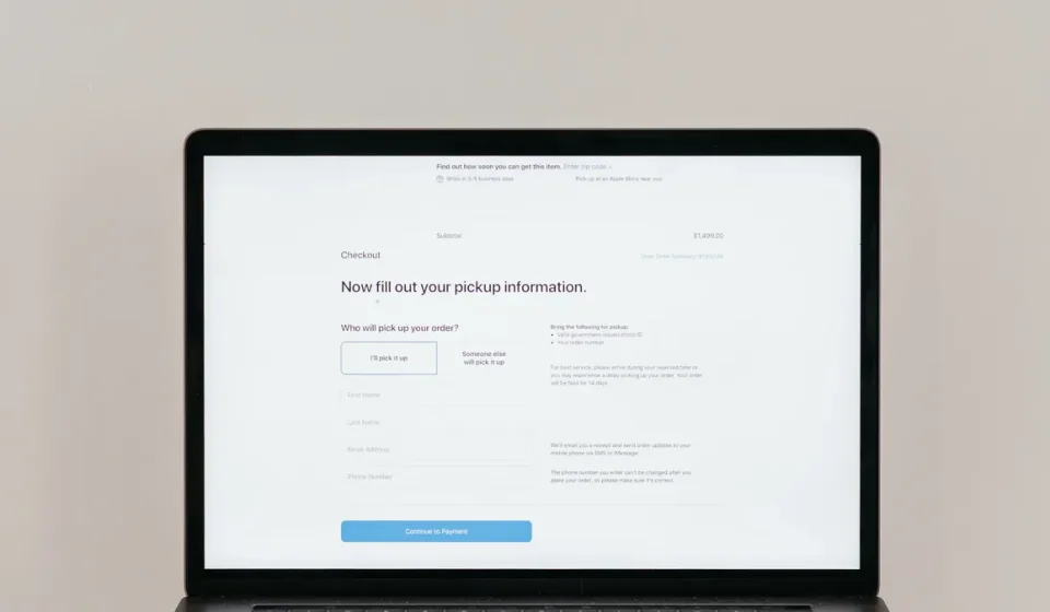 Laptop displaying a simple webpage form